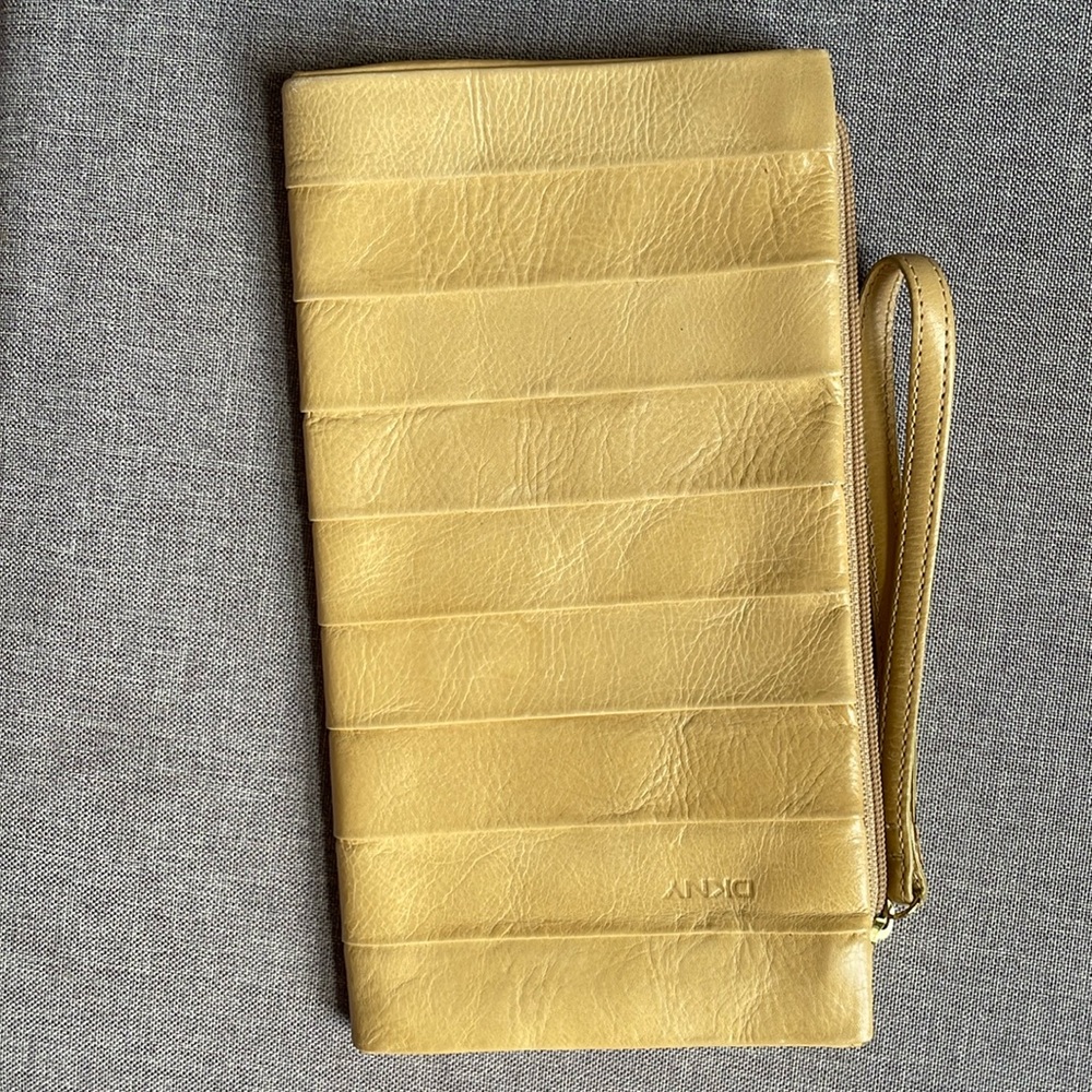 Pre-owned DKNY soft, buttery leather clutch, cream-tan color